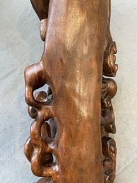 A large Chinese carved wooden ruyi scepter, 19th C.