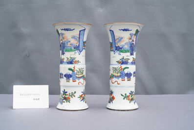 A pair of Chinese wucai 'gu' vases, 19th C.