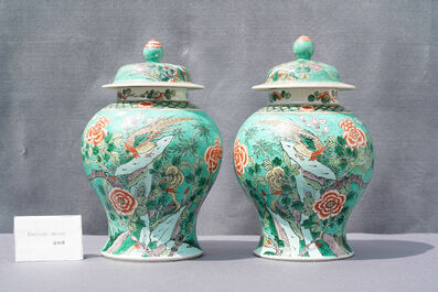 A pair of Chinese turquoise-ground famille verte vases and covers, 19th C.