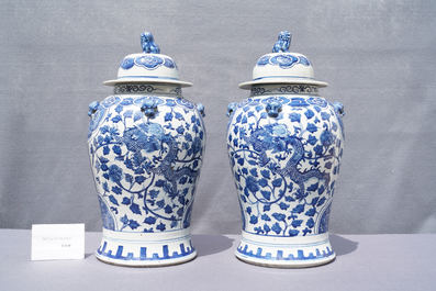 Two pairs of Chinese blue and white and famille verte vases and covers, 19/20th C.