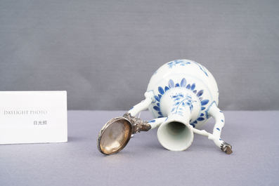 A Chinese blue and white silver-mounted ewer and cover, Transitional period