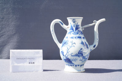 A Chinese blue and white ewer with figures in a landscape, Transitional period