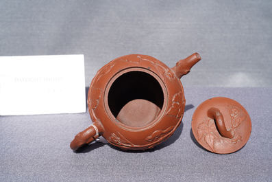 A Chinese Yixing stoneware teapot with squirrels among grapevines, Kangxi