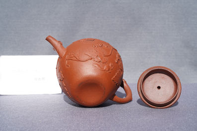 A Chinese Yixing stoneware teapot with squirrels among grapevines, Kangxi