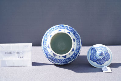 A Chinese blue and white 'lotus scroll' jar and cover, Transitional period