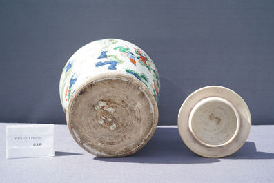 A Chinese wucai 'playing boys' vase and cover, Transitional period