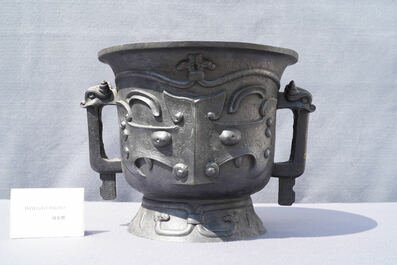 A large Chinese gold-splashed bronze 'taotie' censer, 19/20th C.