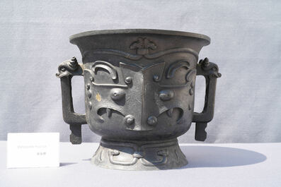 A large Chinese gold-splashed bronze 'taotie' censer, 19/20th C.