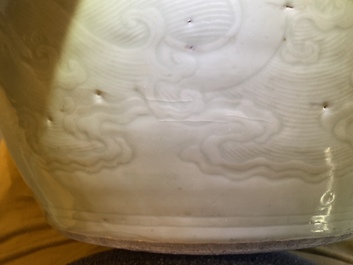 A globular Chinese monochrome celadon 'dragon' vase, Kangxi