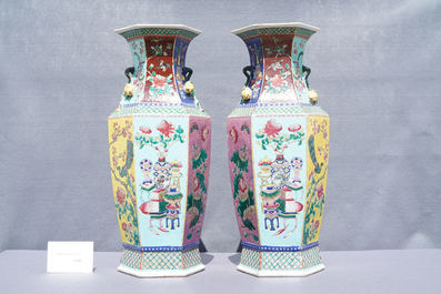 A pair of Chinese hexagonal famille rose vases, 19th C.