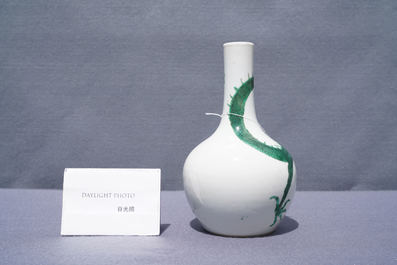 A Chinese famille verte 'dragon' bottle vase, Kangxi mark, 19th C.