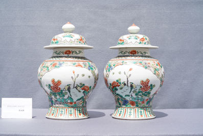 Two pairs of Chinese blue and white and famille verte vases and covers, 19/20th C.