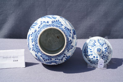 A Chinese blue and white 'horseriders' vase and cover, Kangxi
