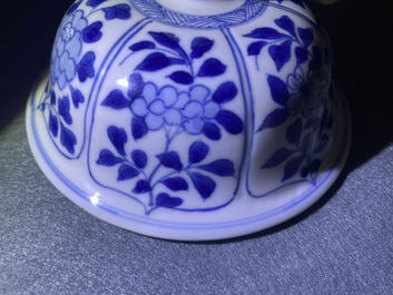 A Chinese blue and white 'horseriders' vase and cover, Kangxi