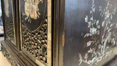 A Chinese or Vietnamese mother-of-pearl-inlaid wooden two-door cabinet, 19th C.