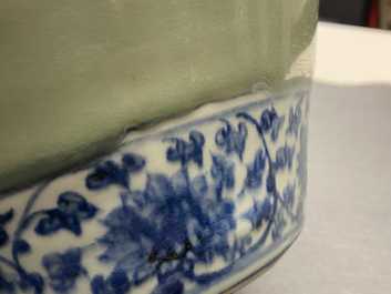 A Chinese celadon-ground and blue and white 'lotus scroll' jar, Ming