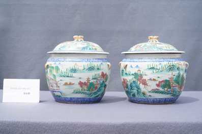 A pair of Chinese famille rose bowls and covers with landscapes, Qianlong mark, Republic