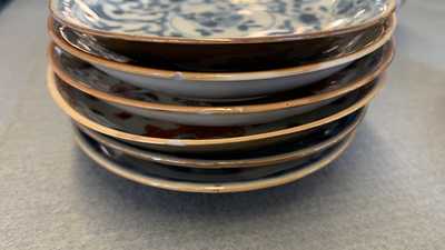 31 Chinese capucine brown-ground saucers and 22 cups, Kangxi/Qianlong