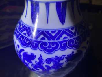 A Chinese blue and white 'lotus scroll' jar and cover, Transitional period