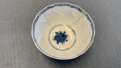 A collection of Chinese and Japanese blue and white cups and saucers and two ewers, Wanli and later