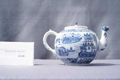 A Chinese blue and white teapot and cover with figures in a landscape, 19th C.