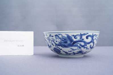 A Chinese blue and white 'dragon' bowl with a double vajra in the centre, Chenghua mark, Kangxi