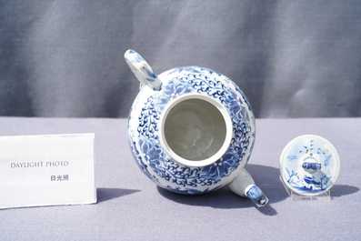 A Chinese blue and white teapot and cover with figures in a landscape, 19th C.