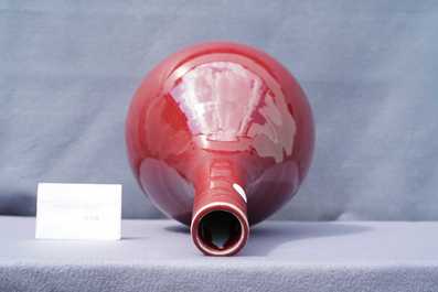 A Chinese monochrome sang de boeuf bottle vase, 19/20th C.