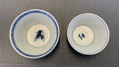 Eighteen Chinese blue and white saucers, seven cups, two dishes and a tea caddy, Kangxi/Qianlong