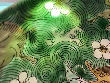 A shallow Chinese verte biscuit 'mythical beast' bowl, Jiajing mark, Kangxi