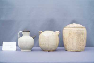 A Chinese celadon-glazed 'Jue' ewer, a qingbai-glazed wine ewer and a storage vessel, Song/Yuan