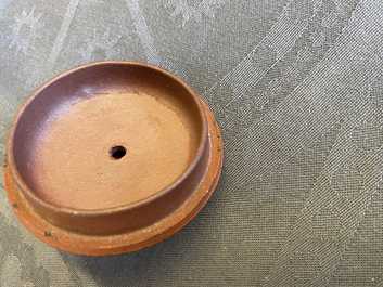 A Chinese Yixing stoneware teapot with squirrels among grapevines, Kangxi