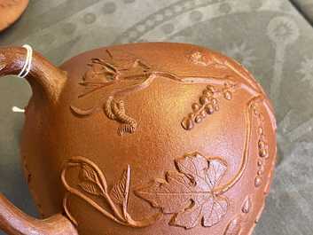 A Chinese Yixing stoneware teapot with squirrels among grapevines, Kangxi