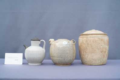 A Chinese celadon-glazed 'Jue' ewer, a qingbai-glazed wine ewer and a storage vessel, Song/Yuan