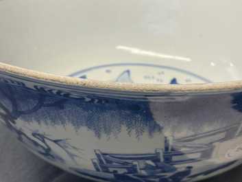 A large Chinese blue and white bowl with figures in a landscape, Kangxi