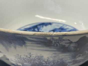 A large Chinese blue and white bowl with figures in a landscape, Kangxi