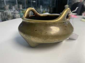 A Chinese bronze tripod censer, Yu Tang Qing Wan mark, Kangxi