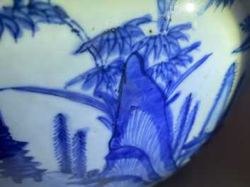 Un grand bol en porcelaine de Chine en bleu et blanc &agrave; d&eacute;cor d'un paysage fluvial, Ming
