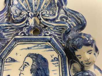 A pair of Dutch Delft blue and white appliques with royalist portraits of prince William IV and princess Anne, 18th C.