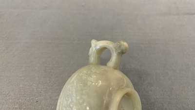 A Chinese celadon jade two-handled libation cup, Ming