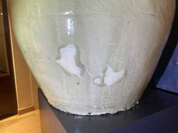 A large Chinese monochrome cream-glazed bulbous vase, 18/19th C.