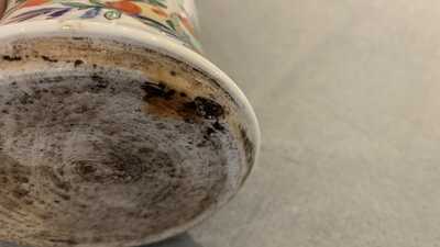 A pair of Chinese wucai 'gu' vases, 19th C.