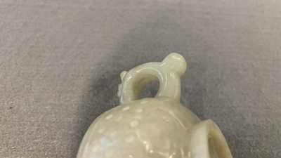 A Chinese celadon jade two-handled libation cup, Ming