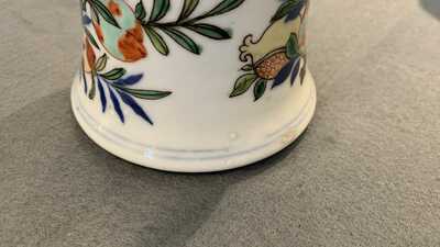 A pair of Chinese wucai 'gu' vases, 19th C.