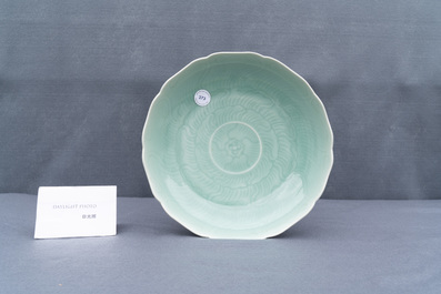 Un plat 'lotus' en porcelaine de Chine c&eacute;ladon monochrome, Qianlong