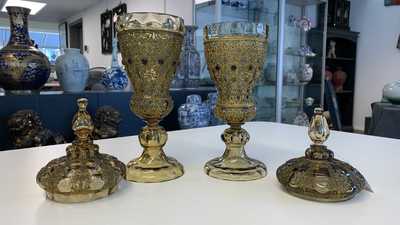 A pair of Russian or Eastern-European gilt copper and glass-inlaid glass goblets and covers, 19th C.