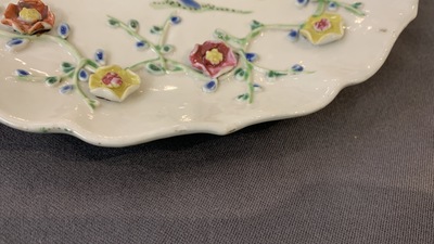 A pair of Chinese famille rose relief-decorated dishes, Yongzheng