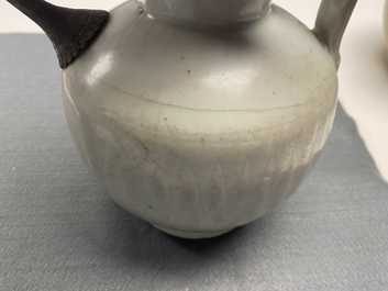 A Chinese celadon-glazed 'Jue' ewer, a qingbai-glazed wine ewer and a storage vessel, Song/Yuan