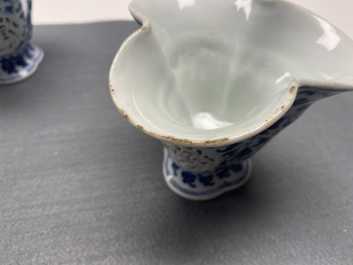 A pair of rare Chinese blue and white double-walled reticulated trilobed libation cups, Qianlong