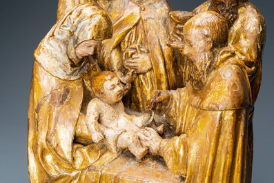 A partly gilded polychrome wooden 'Circumcision' group, Flanders, 16th C.